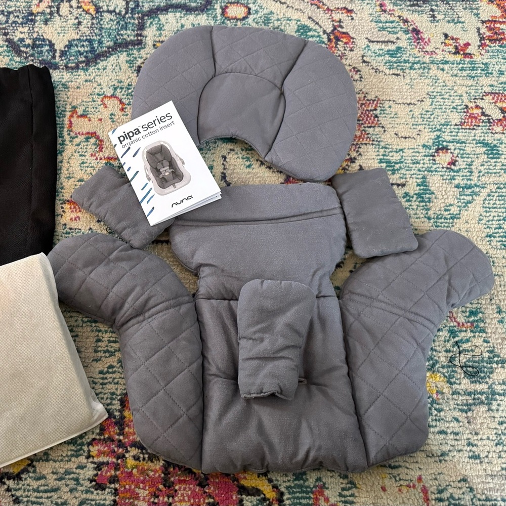 Nuna Pipa series infant insert for car seat in gray